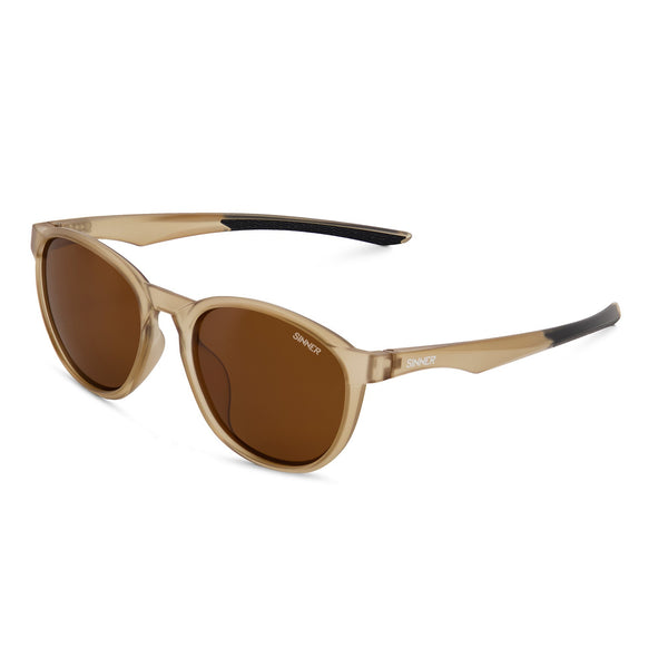 A pair of round-frame sunglasses with translucent champagne-gold frames, brown lenses, and black temple tips, shown on a clean white background.